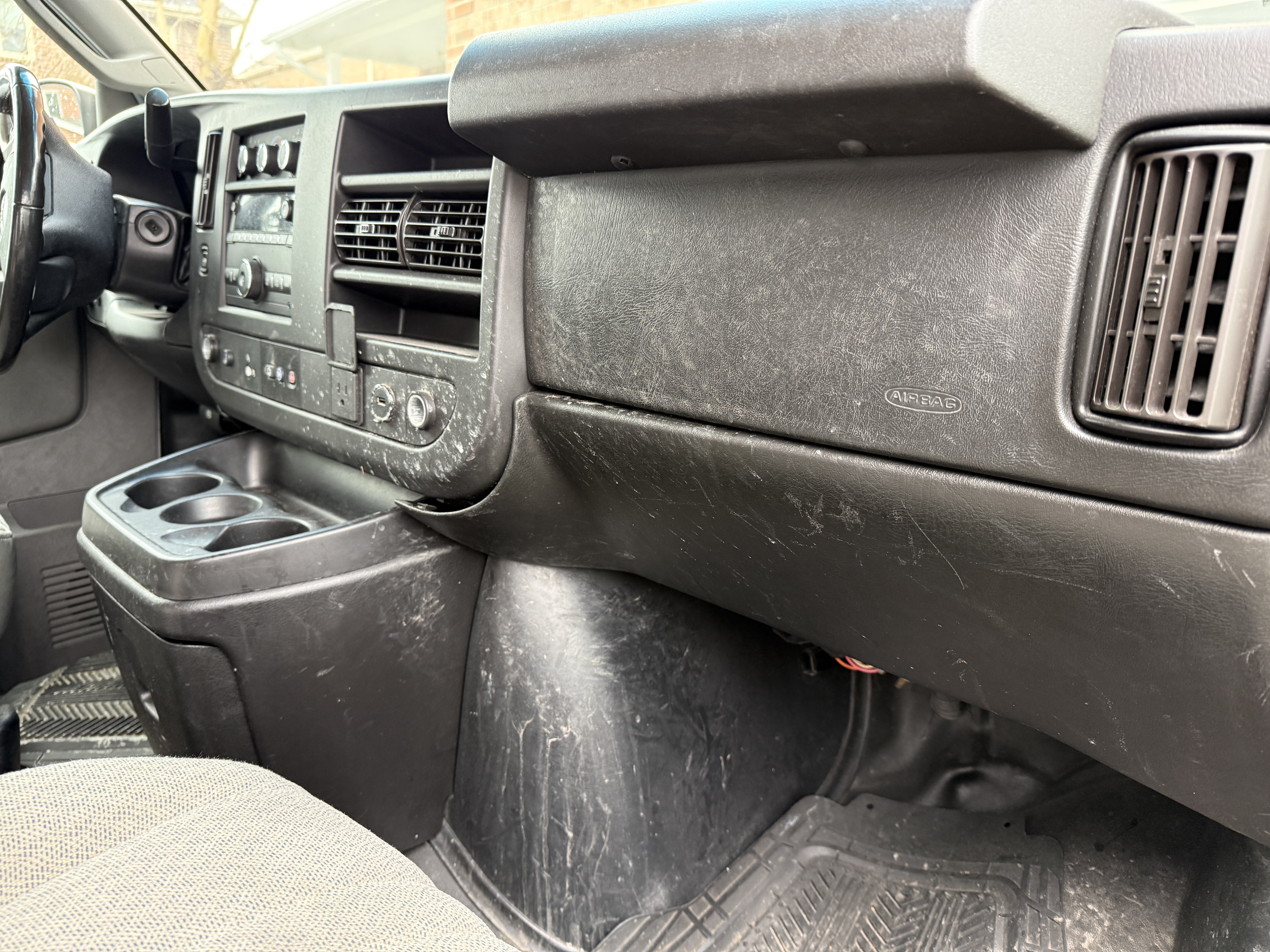 GMC Van dashboard before detailing