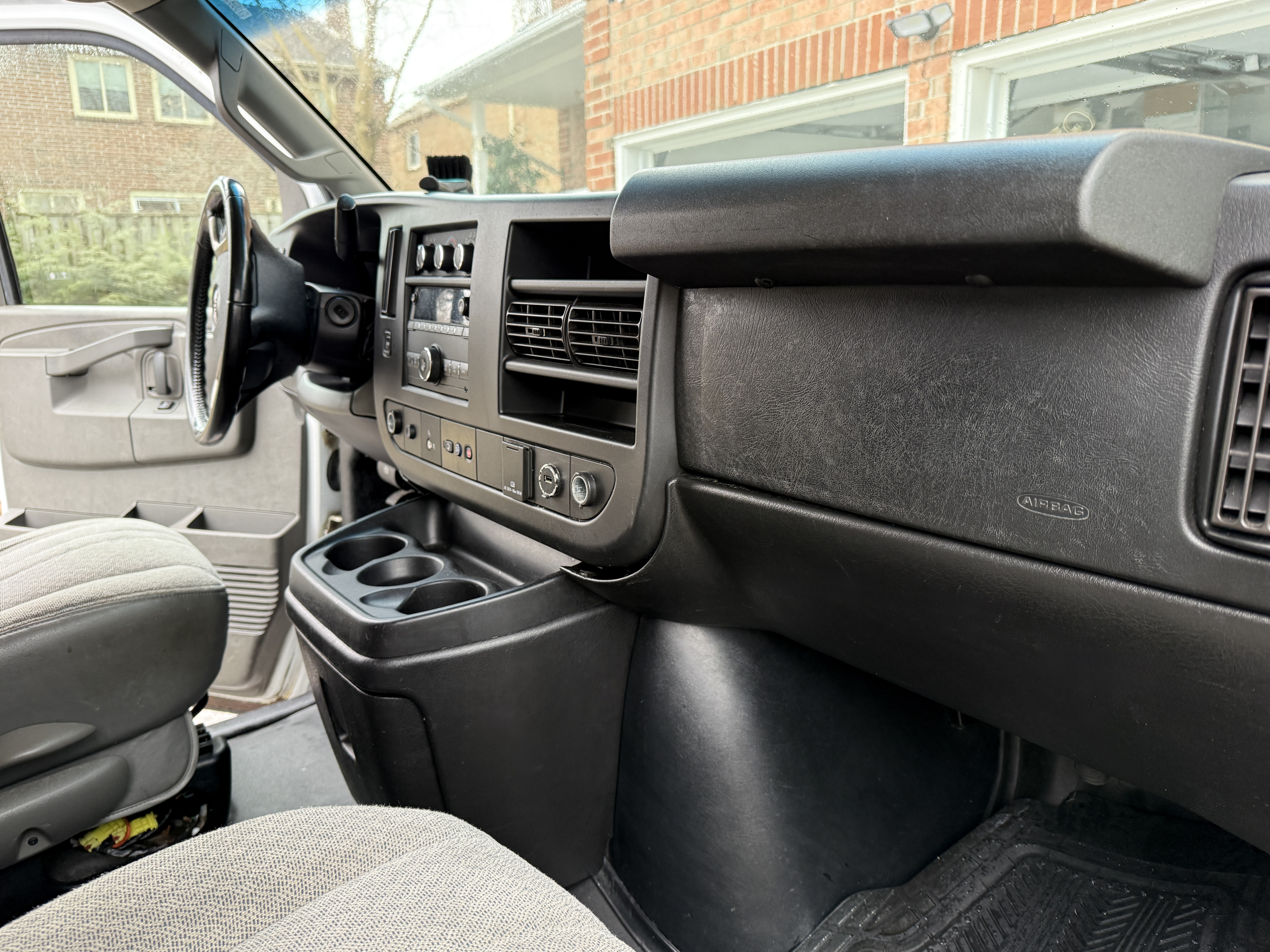 GMC Van dashboard after detailing