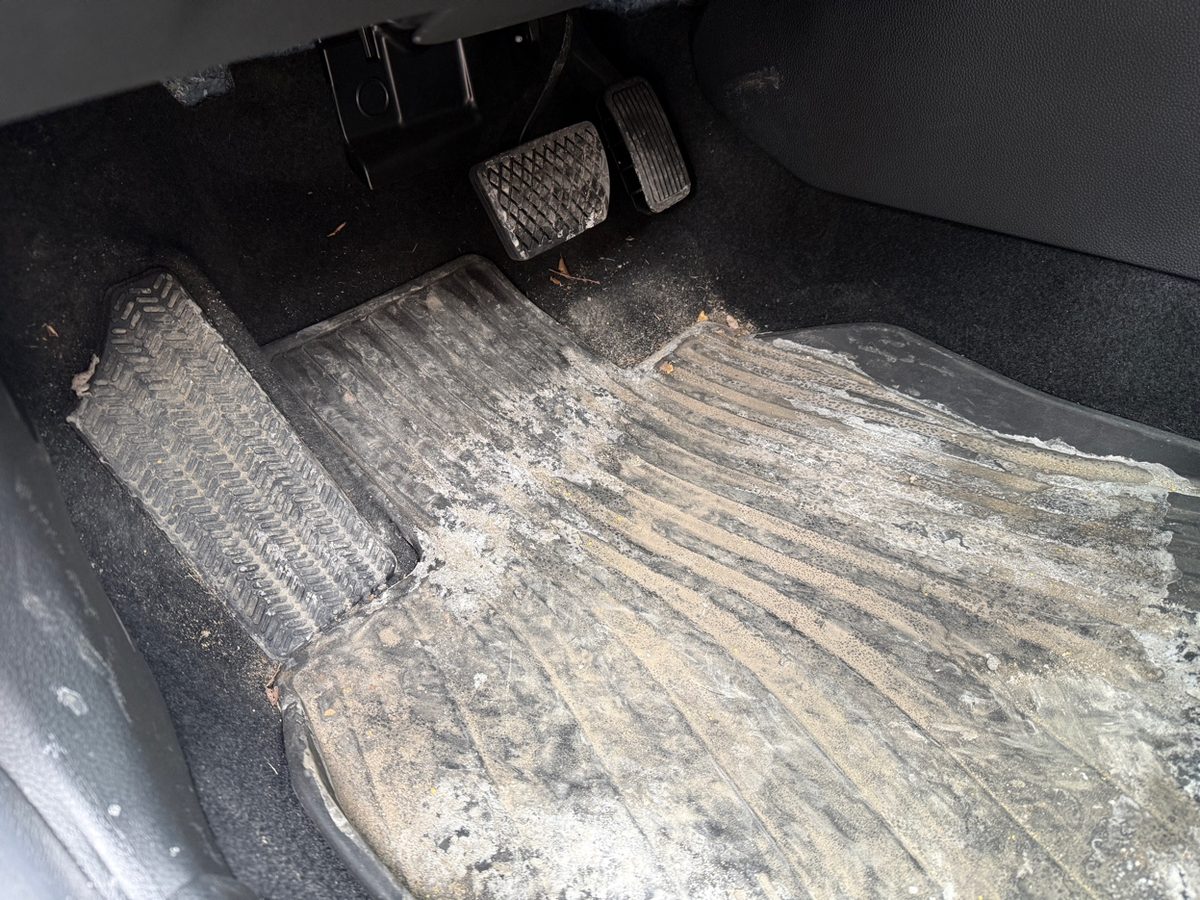 Before: salt-covered floor mats